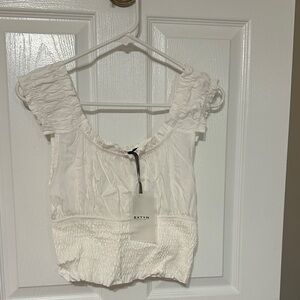 Elegant White Smocked Blouse by [Brand]